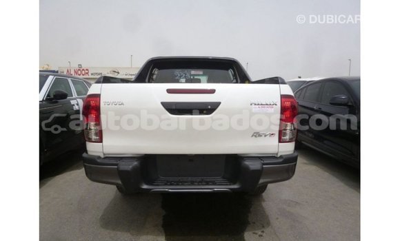 Buy Import Toyota Hilux White Car in Import - Dubai in Barbados Buy Import Toyota Hilux White Car in Import - Dubai in Barbados