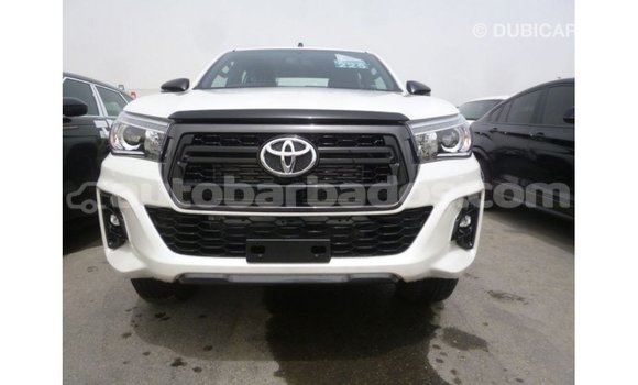 Buy Import Toyota Hilux White Car in Import - Dubai in Barbados Buy Import Toyota Hilux White Car in Import - Dubai in Barbados