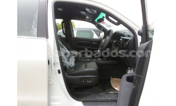 Buy Import Toyota Hilux White Car in Import - Dubai in Barbados Buy Import Toyota Hilux White Car in Import - Dubai in Barbados