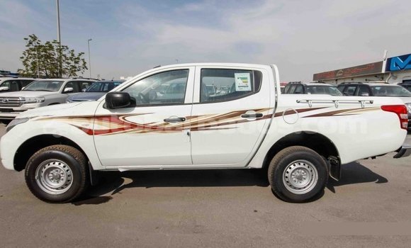 Buy Import Mitsubishi L200 White Car in Import - Dubai in Barbados Buy Import Mitsubishi L200 White Car in Import - Dubai in Barbados