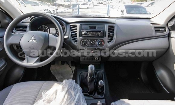Buy Import Mitsubishi L200 White Car in Import - Dubai in Barbados Buy Import Mitsubishi L200 White Car in Import - Dubai in Barbados