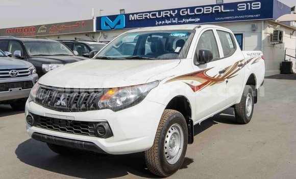 Buy Import Mitsubishi L200 White Car in Import - Dubai in Barbados Buy Import Mitsubishi L200 White Car in Import - Dubai in Barbados