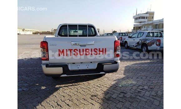 Buy Import Mitsubishi L200 White Car in Import - Dubai in Barbados Buy Import Mitsubishi L200 White Car in Import - Dubai in Barbados