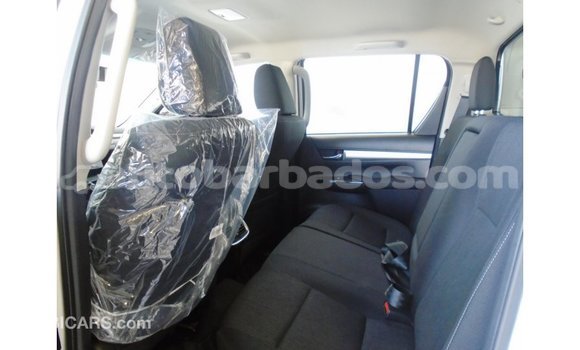 Buy Import Toyota Hilux White Car in Import - Dubai in Barbados Buy Import Toyota Hilux White Car in Import - Dubai in Barbados
