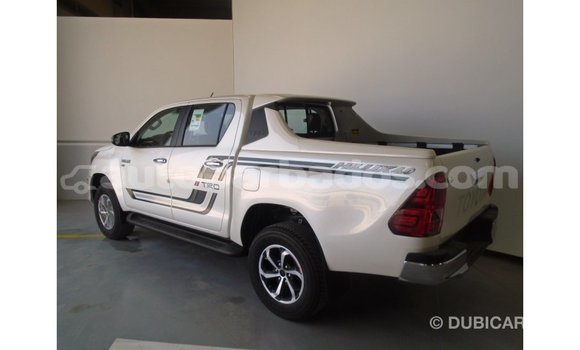 Buy Import Toyota Hilux White Car in Import - Dubai in Barbados Buy Import Toyota Hilux White Car in Import - Dubai in Barbados