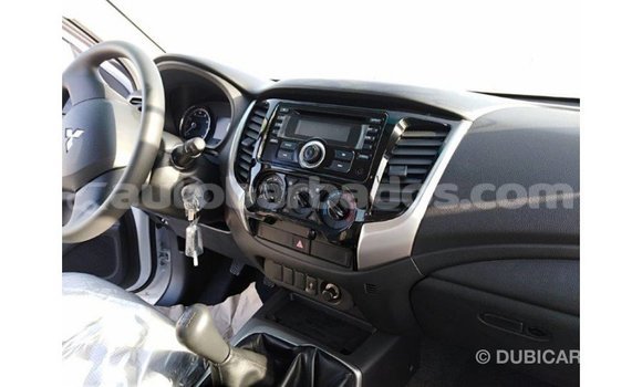 Buy Import Mitsubishi L200 White Car in Import - Dubai in Barbados Buy Import Mitsubishi L200 White Car in Import - Dubai in Barbados
