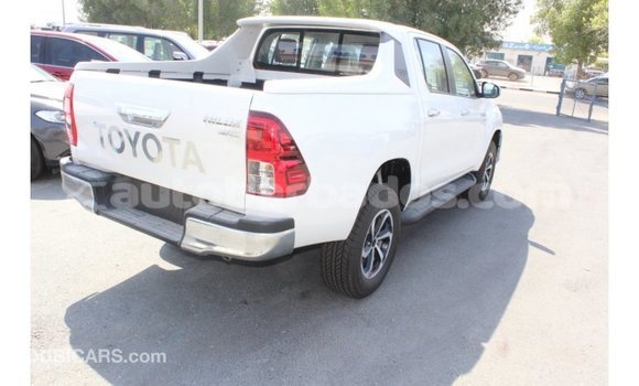 Buy Import Toyota Hilux White Car in Import - Dubai in Barbados Buy Import Toyota Hilux White Car in Import - Dubai in Barbados