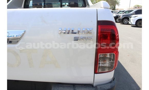 Buy Import Toyota Hilux White Car in Import - Dubai in Barbados Buy Import Toyota Hilux White Car in Import - Dubai in Barbados