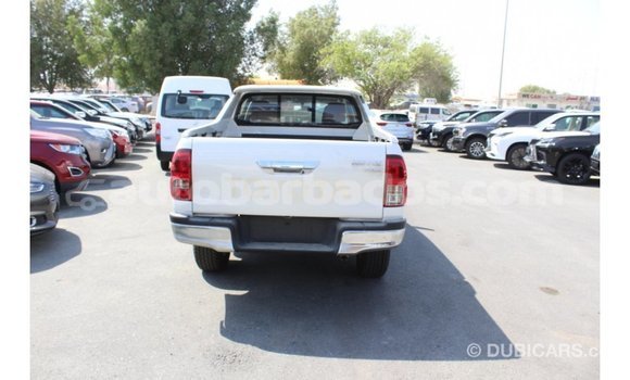Buy Import Toyota Hilux White Car in Import - Dubai in Barbados Buy Import Toyota Hilux White Car in Import - Dubai in Barbados