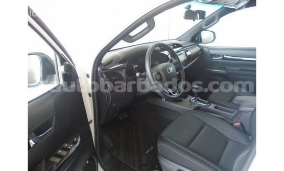 Buy Import Toyota Hilux White Car in Import - Dubai in Barbados Buy Import Toyota Hilux White Car in Import - Dubai in Barbados
