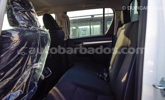 Buy Import Toyota Hilux White Car in Import - Dubai in Barbados Buy Import Toyota Hilux White Car in Import - Dubai in Barbados