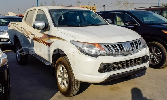 Buy Import Mitsubishi L200 White Car in Import - Dubai in Barbados Buy Import Mitsubishi L200 White Car in Import - Dubai in Barbados