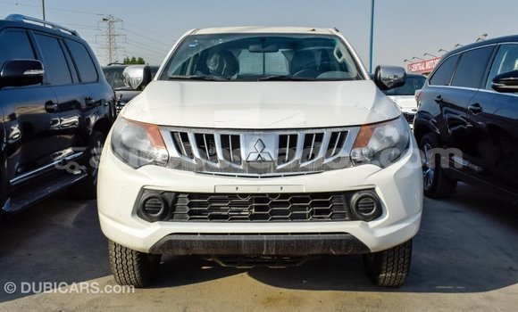 Buy Import Mitsubishi L200 White Car in Import - Dubai in Barbados Buy Import Mitsubishi L200 White Car in Import - Dubai in Barbados
