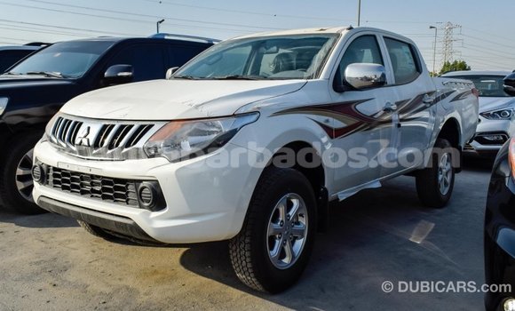 Buy Import Mitsubishi L200 White Car in Import - Dubai in Barbados Buy Import Mitsubishi L200 White Car in Import - Dubai in Barbados