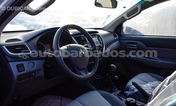 Buy Import Mitsubishi L200 White Car in Import - Dubai in Barbados Buy Import Mitsubishi L200 White Car in Import - Dubai in Barbados