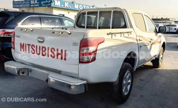 Buy Import Mitsubishi L200 White Car in Import - Dubai in Barbados Buy Import Mitsubishi L200 White Car in Import - Dubai in Barbados
