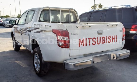 Buy Import Mitsubishi L200 White Car in Import - Dubai in Barbados Buy Import Mitsubishi L200 White Car in Import - Dubai in Barbados