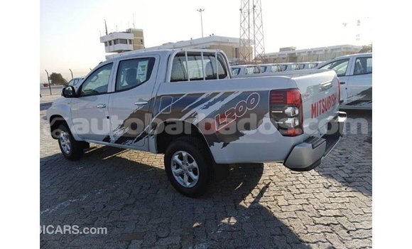 Buy Import Mitsubishi L200 White Car in Import - Dubai in Barbados Buy Import Mitsubishi L200 White Car in Import - Dubai in Barbados