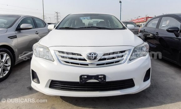 Buy Import Toyota Corolla White Car in Import - Dubai in Barbados Buy Import Toyota Corolla White Car in Import - Dubai in Barbados