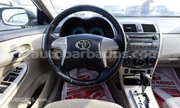 Buy Import Toyota Corolla White Car in Import - Dubai in Barbados Buy Import Toyota Corolla White Car in Import - Dubai in Barbados
