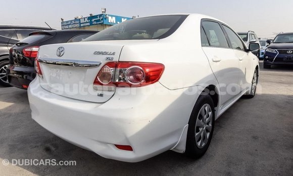 Buy Import Toyota Corolla White Car in Import - Dubai in Barbados Buy Import Toyota Corolla White Car in Import - Dubai in Barbados