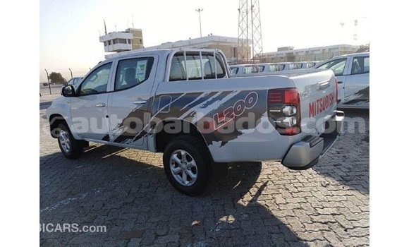Buy Import Mitsubishi L200 White Car in Import - Dubai in Barbados Buy Import Mitsubishi L200 White Car in Import - Dubai in Barbados