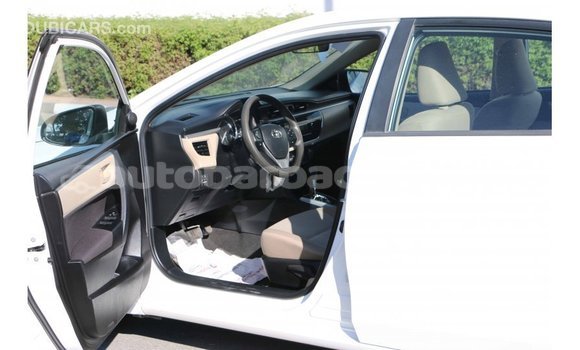 Buy Import Toyota Corolla White Car in Import - Dubai in Barbados Buy Import Toyota Corolla White Car in Import - Dubai in Barbados