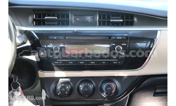 Buy Import Toyota Corolla White Car in Import - Dubai in Barbados Buy Import Toyota Corolla White Car in Import - Dubai in Barbados