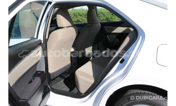 Buy Import Toyota Corolla White Car in Import - Dubai in Barbados Buy Import Toyota Corolla White Car in Import - Dubai in Barbados