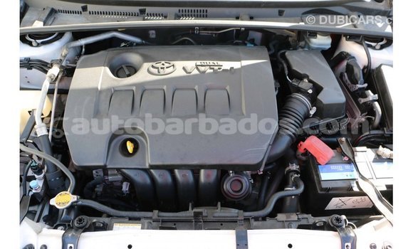 Buy Import Toyota Corolla White Car in Import - Dubai in Barbados Buy Import Toyota Corolla White Car in Import - Dubai in Barbados