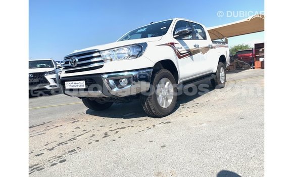 Buy Import Toyota Hilux White Car in Import - Dubai in Barbados Buy Import Toyota Hilux White Car in Import - Dubai in Barbados