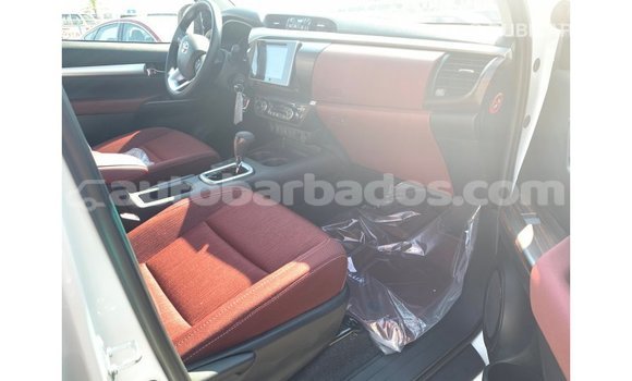 Buy Import Toyota Hilux White Car in Import - Dubai in Barbados Buy Import Toyota Hilux White Car in Import - Dubai in Barbados