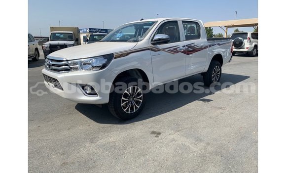 Buy Import Toyota Hilux White Car in Import - Dubai in Barbados Buy Import Toyota Hilux White Car in Import - Dubai in Barbados