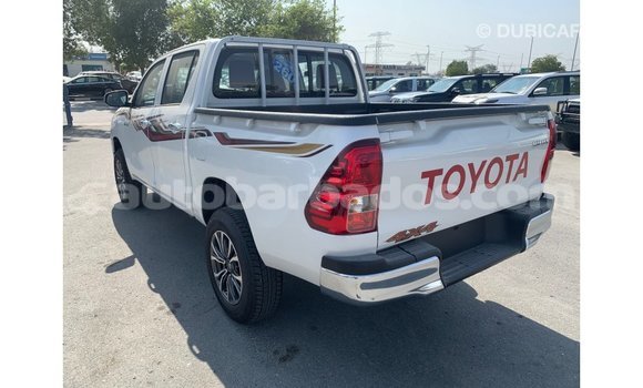 Buy Import Toyota Hilux White Car in Import - Dubai in Barbados Buy Import Toyota Hilux White Car in Import - Dubai in Barbados