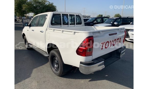 Buy Import Toyota Hilux White Car in Import - Dubai in Barbados Buy Import Toyota Hilux White Car in Import - Dubai in Barbados