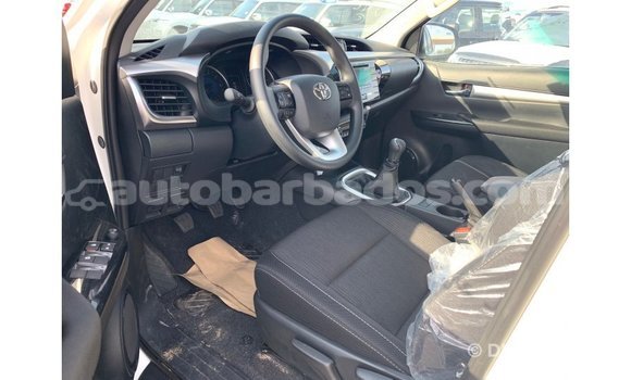 Buy Import Toyota Hilux White Car in Import - Dubai in Barbados Buy Import Toyota Hilux White Car in Import - Dubai in Barbados