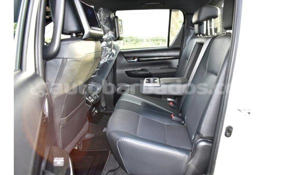 Buy Import Toyota Hilux White Car in Import - Dubai in Barbados Buy Import Toyota Hilux White Car in Import - Dubai in Barbados