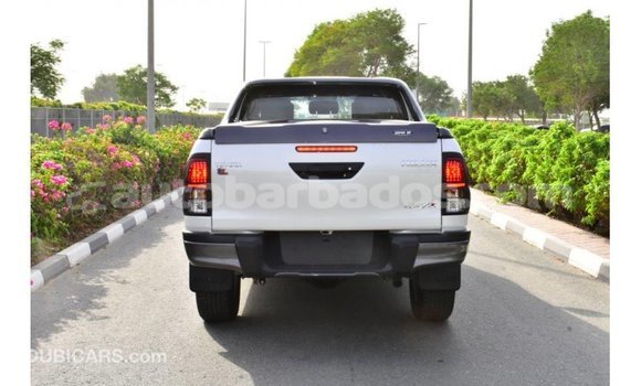 Buy Import Toyota Hilux White Car in Import - Dubai in Barbados Buy Import Toyota Hilux White Car in Import - Dubai in Barbados