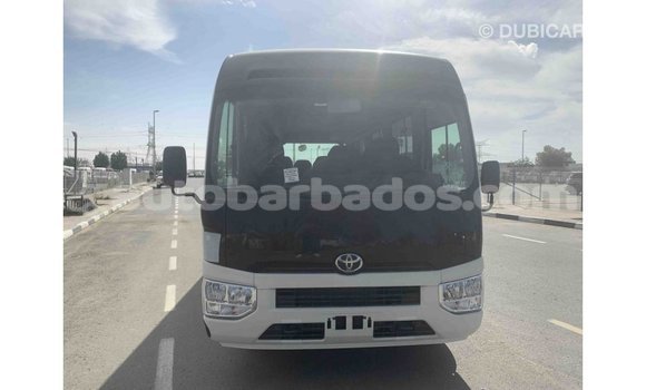 Buy Import Toyota Coaster White Car in Import - Dubai in Barbados Buy Import Toyota Coaster White Car in Import - Dubai in Barbados