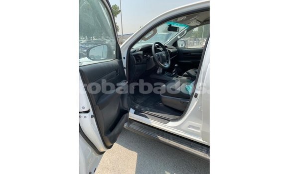 Buy Import Toyota Hilux White Car in Import - Dubai in Barbados Buy Import Toyota Hilux White Car in Import - Dubai in Barbados