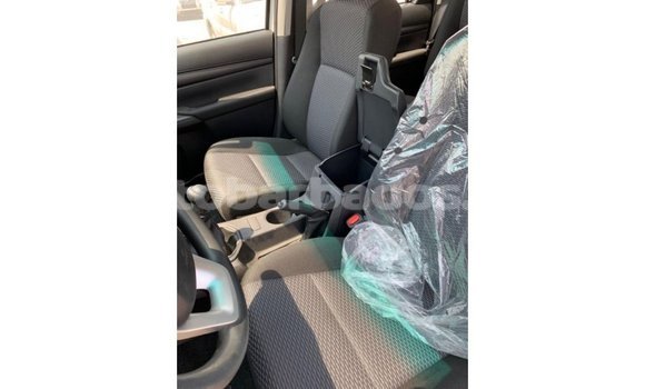 Buy Import Toyota Hilux White Car in Import - Dubai in Barbados Buy Import Toyota Hilux White Car in Import - Dubai in Barbados