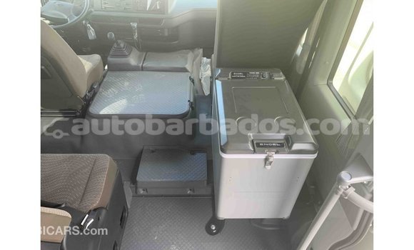 Buy Import Toyota Coaster White Car in Import - Dubai in Barbados Buy Import Toyota Coaster White Car in Import - Dubai in Barbados