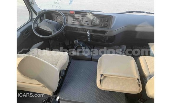 Buy Import Toyota Coaster White Car in Import - Dubai in Barbados Buy Import Toyota Coaster White Car in Import - Dubai in Barbados