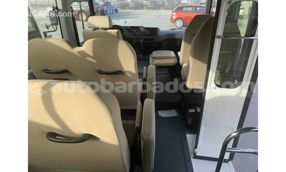 Buy Import Toyota Coaster White Car in Import - Dubai in Barbados Buy Import Toyota Coaster White Car in Import - Dubai in Barbados