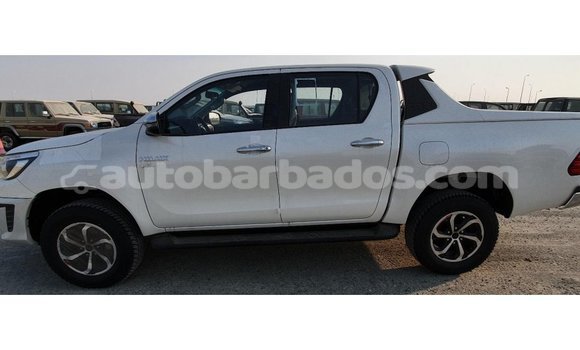 Buy Import Toyota Hilux White Car in Import - Dubai in Barbados Buy Import Toyota Hilux White Car in Import - Dubai in Barbados