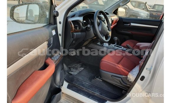 Buy Import Toyota Hilux White Car in Import - Dubai in Barbados Buy Import Toyota Hilux White Car in Import - Dubai in Barbados