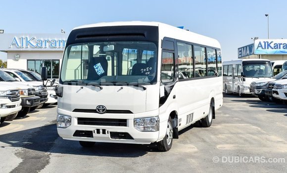 Buy Import Toyota Coaster White Car in Import - Dubai in Barbados Buy Import Toyota Coaster White Car in Import - Dubai in Barbados