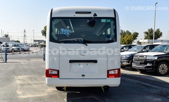 Buy Import Toyota Coaster White Car in Import - Dubai in Barbados Buy Import Toyota Coaster White Car in Import - Dubai in Barbados