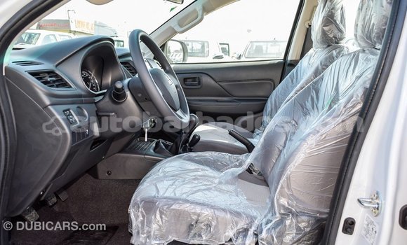 Buy Import Mitsubishi L200 White Car in Import - Dubai in Barbados Buy Import Mitsubishi L200 White Car in Import - Dubai in Barbados