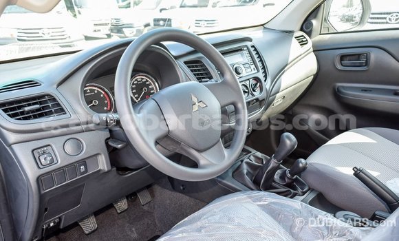 Buy Import Mitsubishi L200 White Car in Import - Dubai in Barbados Buy Import Mitsubishi L200 White Car in Import - Dubai in Barbados